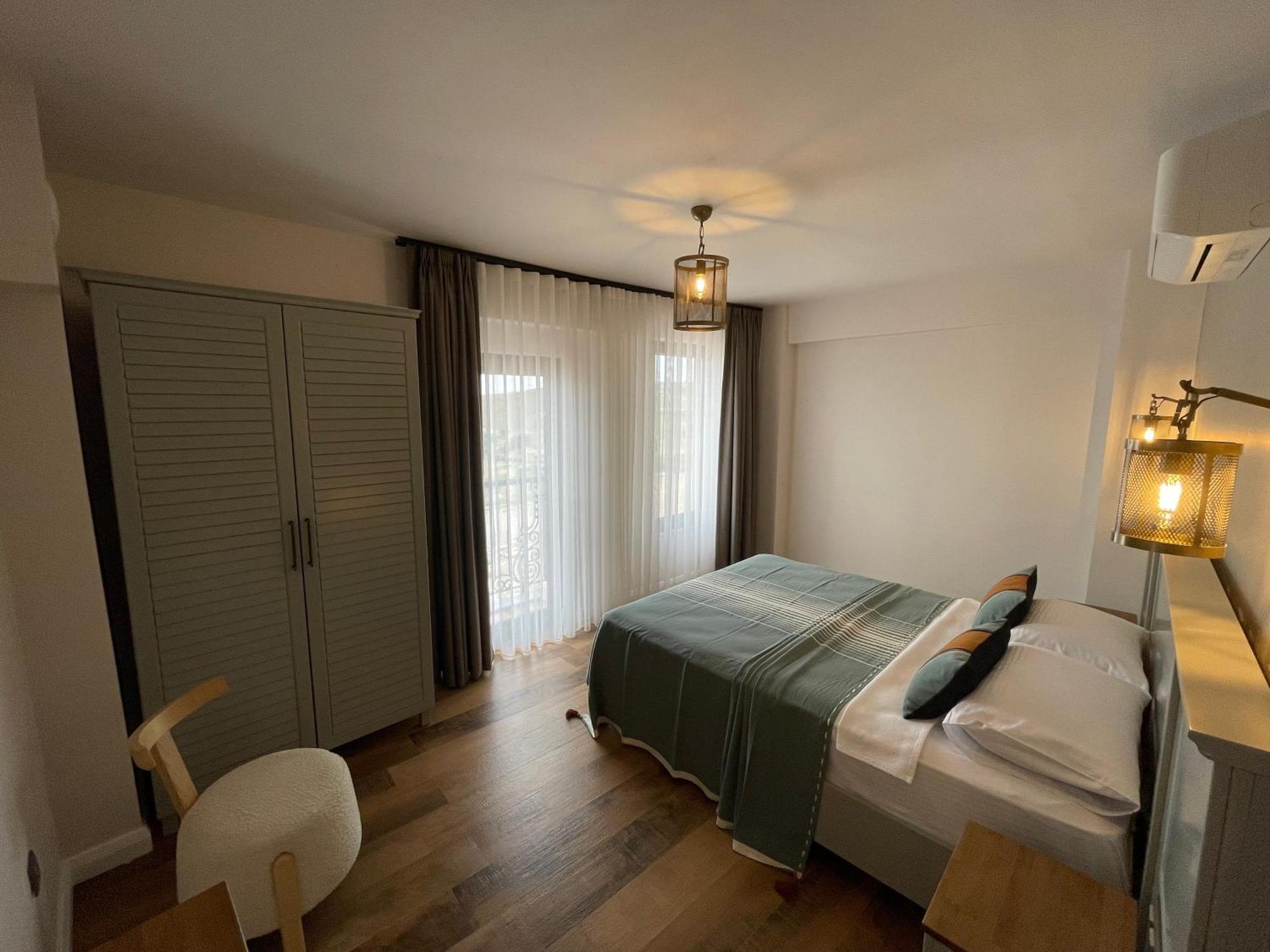 Oikos Bozcaada Aparthotel Bilik gambar